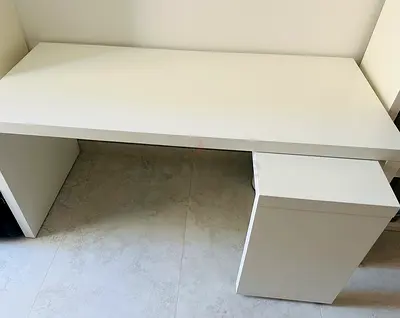 Desk with pull-out panel