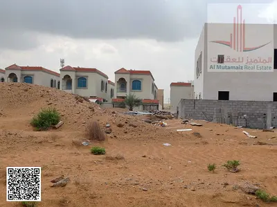 For sale in Ajman, residential investment land for villas in Al Helio 2 area, area 2906 sq ft, ground floor + 1st floor + roof, asking price 670,000