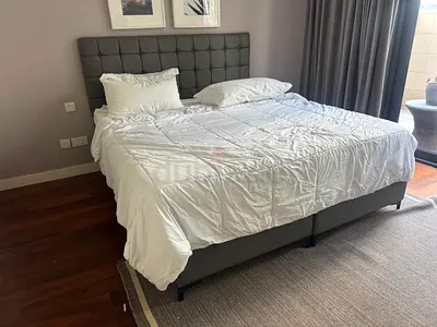 King size bed with upholstered headboard and base (used)