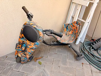 Electronic tripled scooter. Works fine.