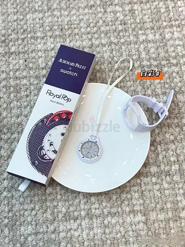 AP X SWATCH quartz with box and strap