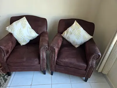Pair of brown suede armchairs with cushions - good condition