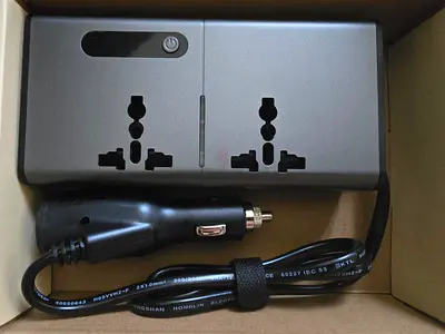 200W car inverter converts 12V DC , USB port AC outlet (laptop charger)