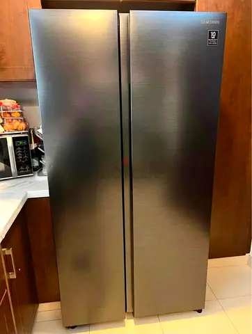 Samsung side by side refrigerators good condition