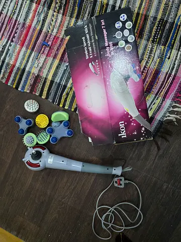 Handheld Electric Body Massager with 7 Attachments (Ikon)