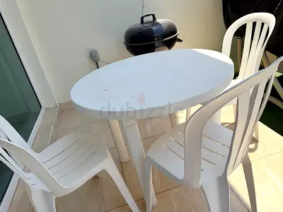 White Outdoor Plastic Table with 3 Chairs - Good Condition
