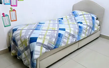 Single upholstered bed with under-bed storage - good condition