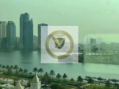 Annual apartment for rent in Al Majaz 1 Sharjah free AC free parking free gym and pool spacious sea view prime location near Corniche UAE