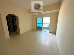 One bedroom apartment with a living room for annual rent in Al Mamzar Sharjah Balcony overlooking Al