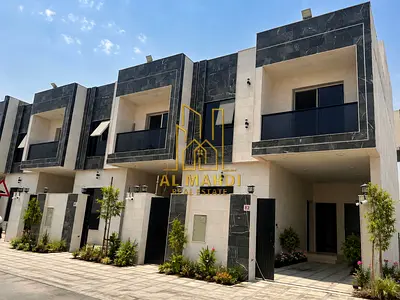 تاون هاوس للبيع  السعر شامل  رسوم التسجيل   تصميم عصري  موقع متميز مع روووف