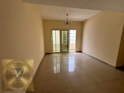 Two bedroom hall spacious areas balcony open view central AC free maintenance easy payment near Al Wahda Street
