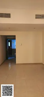 One-bedroom apartment with a living room in Garden City Towers,