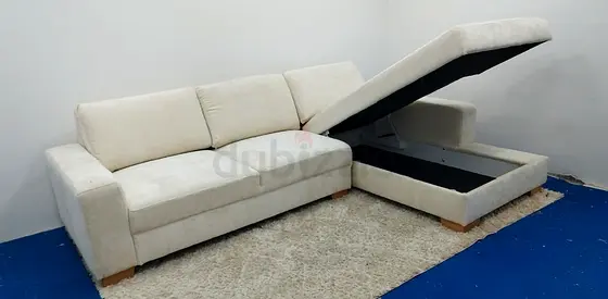 Ikea beige color lshape sofa with chaise lounge storage