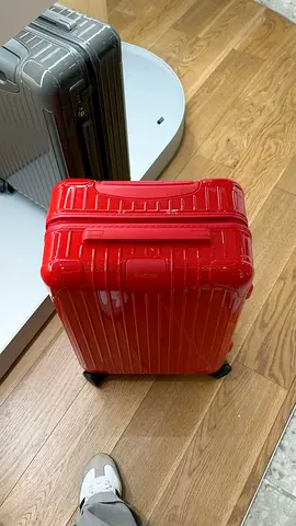 Rimowa Red hard-shell carry-on suitcase