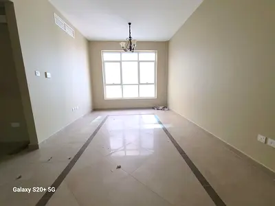 30 days free brand new 1bhk with balcony/ parking tilal city sharjah