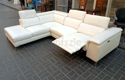 White leather L-shaped reclining corner sofa — 4-seater