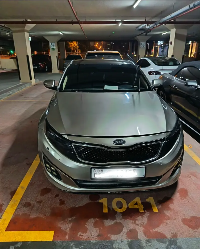 Kia Optima 2013 — photo 1 of 3