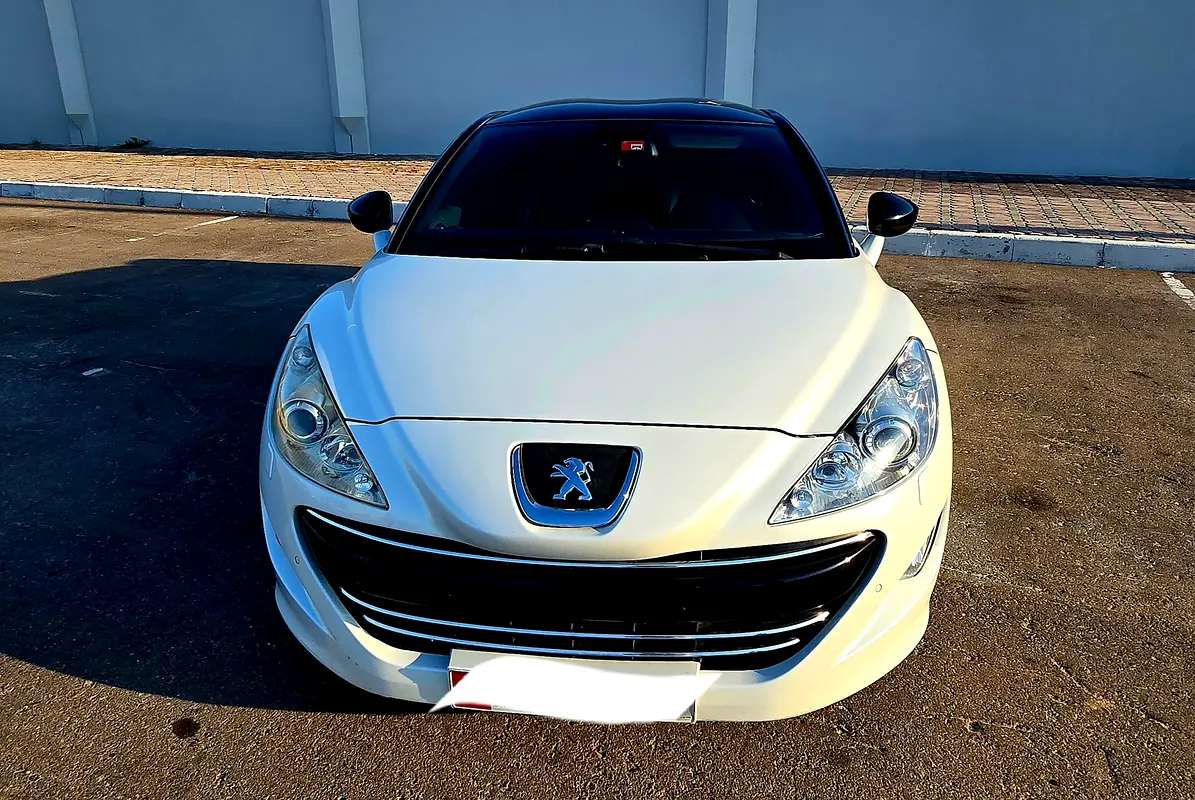 Peugeot RCZ 2011 — photo 1 of 12