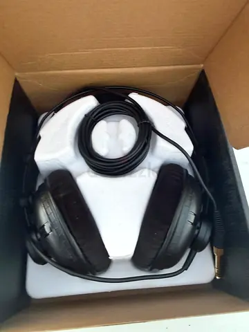 Over-ear wired headphones in original box - good condition