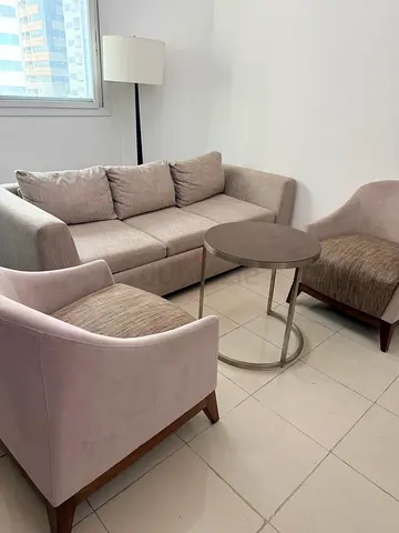 5 seater sofa cum bed with 2 tea tables