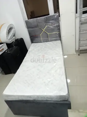 Single bed with mattress and upholstered headboard - good condition