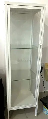 IKEA BAGGEBO glass-door cabinet in white, featuring a metal frame and tempered glass