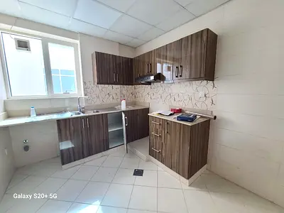 30 days free brand new 1bhk with balcony/ parking tilal city sharjah