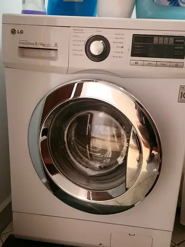 LG Front Load Washing Machine 8/4 kg - works fines ,needs a service