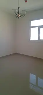 Annual Rent – Muwaileh, Sharjah One-bedroom apartment with a living room (second tenant), featurin