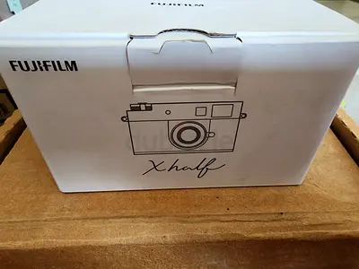 Fujifilm X-Half (boxed) compact half-frame film camera