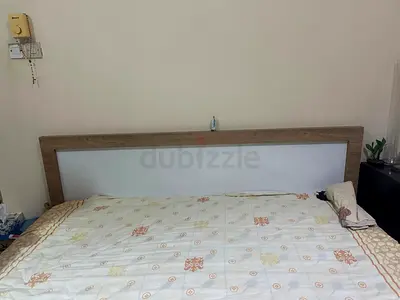 King bed frame with wooden white-accent headboard - good condition