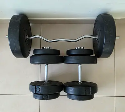 Set of adjustable dumbbells + EZ curl bar with weight plates