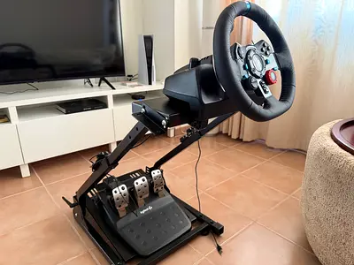 Logitech G29 racing wheel with pedals and stand - good condition