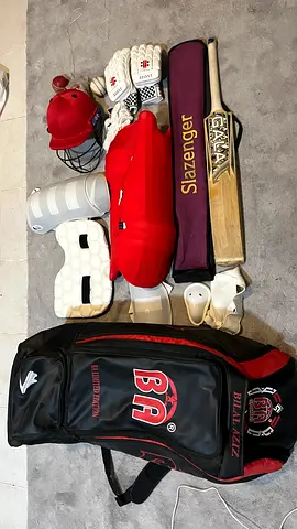 Complete cricket kit with bat, pads, balls,gloves, helmet and bag