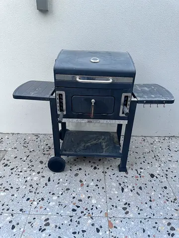Used Charcoal BBQ Grill with Side Shelves and Wheels