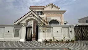 Two-floor villa in Tilal City, Zone C, Sharjah for sale Distinctive stone facade Luxurious finishes