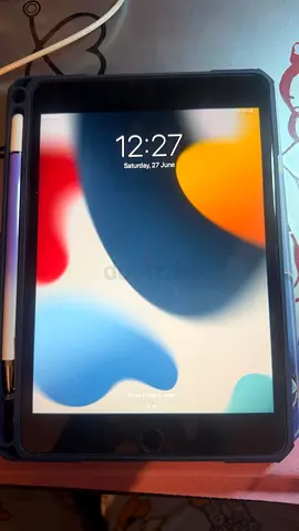 iPad (with Home button) in protective case + Pencil