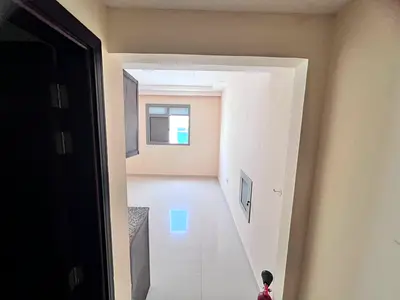 Studio apartment behind Al Hamidiya Police Station, central air conditioning and cooling, easy access to Sharjah and Dubai.