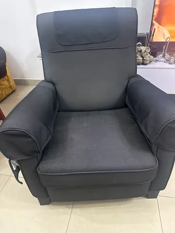 Comfortable single black recliner armchair - good condition