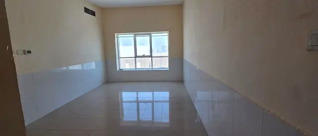 One bedroom and living room, 2 bathrooms, central air conditioning, 24-hour security, easy access to Sharjah and Dubai.