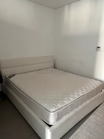 Queen bed with mattress