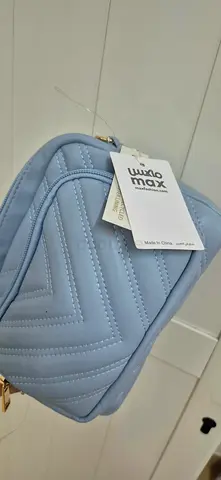 Reduced price. Light blue soft quilted crossbody bag - Brand New with tags from Max