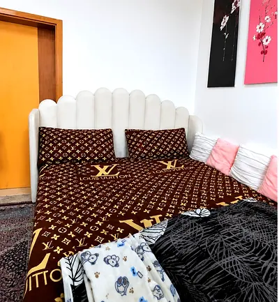 Queen upholstered scallop headboard bed with mattress and bedding (used)
