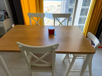 Solid Wood Dining Table with 4 White Cross-back Chairs - Good Condition