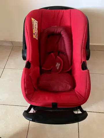 Red Infant Car Seat (rear-facing) in good condition