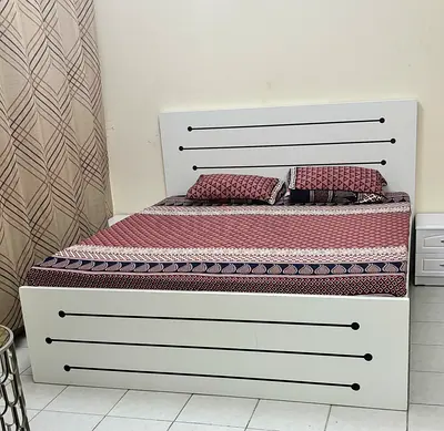 King size bed with matress used only 3 months in excellent condition
