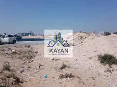 Direct owner land 6,458 SQFT Falaj Al Mualla, Al Dhaid Road, G+2 permit, main road location.