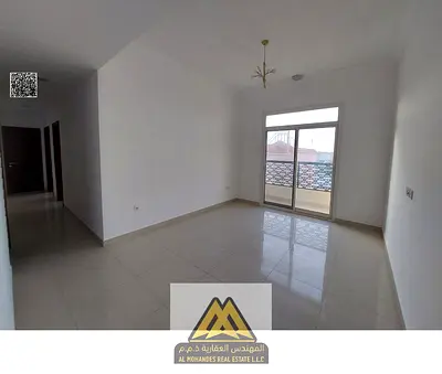 For annual rent: 2-bedroom apartment with a hall in Al Mowaihat 1, large space, 2 bathrooms, balcony, central A/C and central gas. Annual rent: AED 43