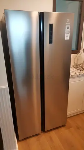 Electrolux side by side fridge freezer latest model good condition