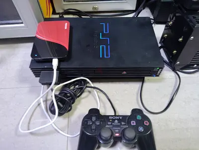 Playstation 2 Fat With lots added 100+ games